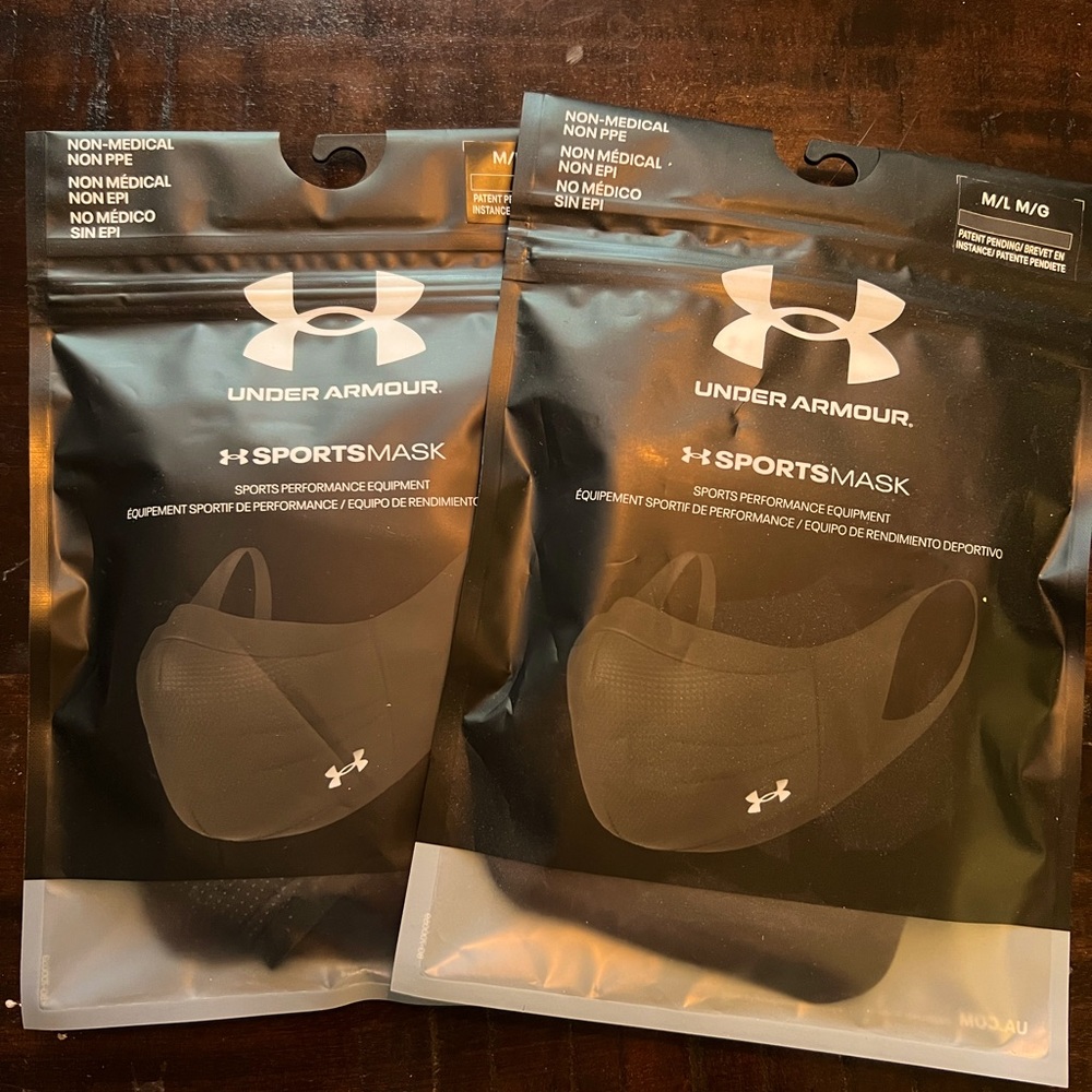 Two Under Armour sport masks.